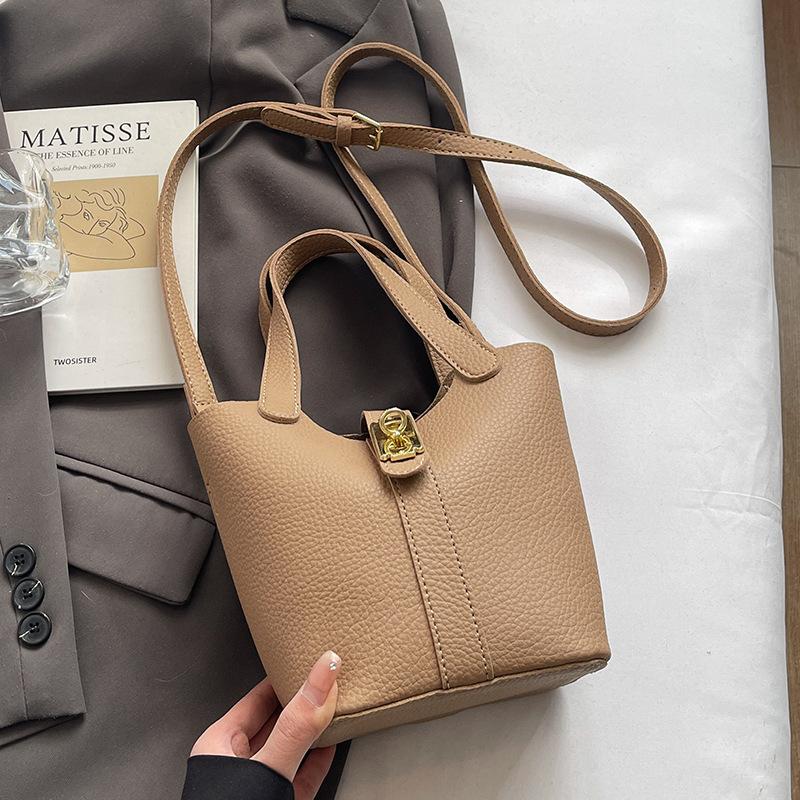 

Весна и лето популярный высококачественный темпераментный повседневный узор личи портативная сумка-ведро женская универсальная простая ветрозащитная сумка-мессенджер мать и дитя