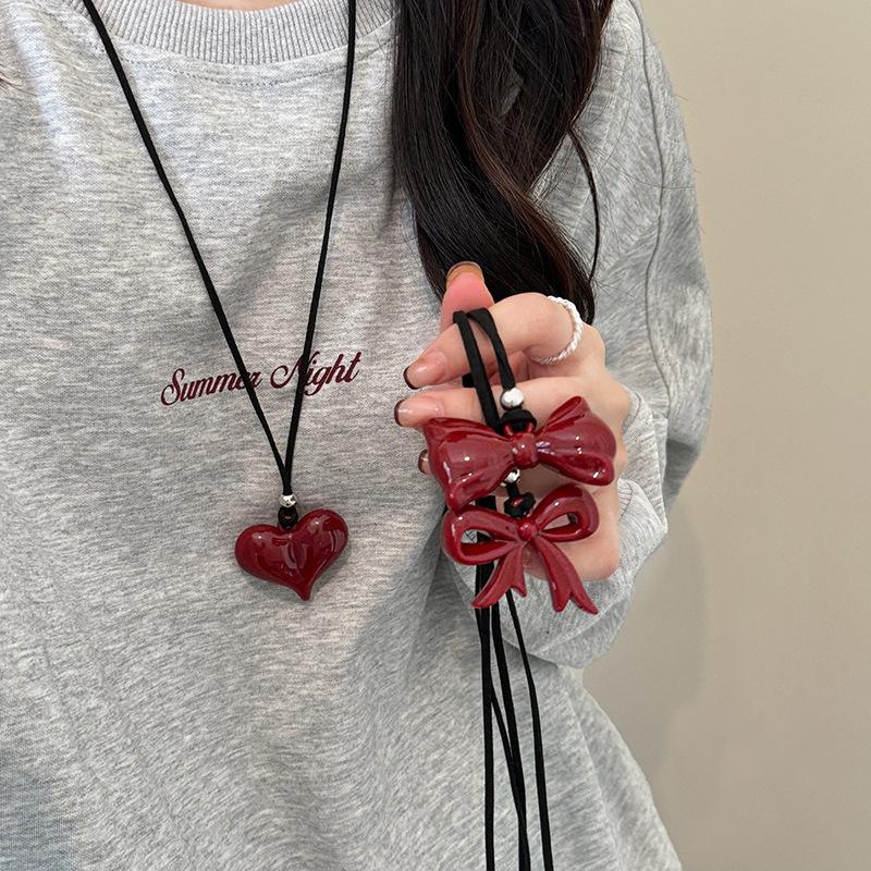 Autumn and Winter Wine Red Ribbon Bow Pendant Necklace Female Love Ankola Red Long Sweater Chain Versatile Accessories