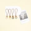 DIY Cowhide Keychain Pendant: Creative Woven Wrist Rope & Car Ornament Accessory