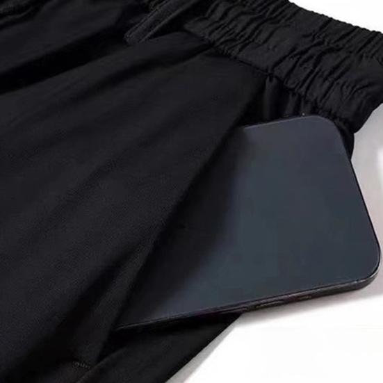 Męskie spodnie Jednolity kolor Elastyczny pas Luźny Elastyczny prosty sznurek Męskie luźne spodnie sznurowane Streetwear