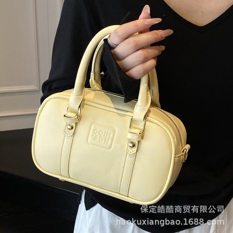 

Корейская версия нишевый дизайн модная универсальная портативная сумка-подушка женская 2025 лето новая высококлассная сумка Boston жёлтый