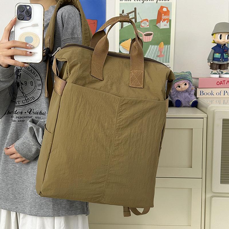 Schoolbag Backpack Women's Waterproof Splash Large Capacity High Value Outdoor Travel Breathable Lightweight Backpack Men's Baigou Bag