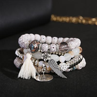 Neues Bohème-Set mit weißen Perlen und Quasten-Armbändern für Damen, Natur-Lava-Stein, Legierung, Flügel-Anhänger, Charm-Armband, Boho-Zirkon