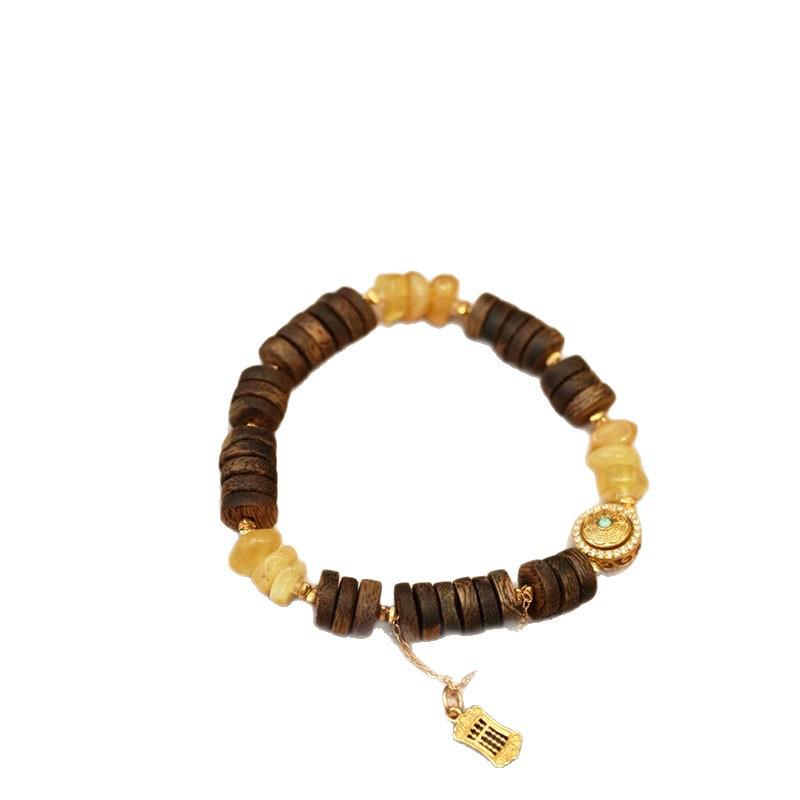 Náramek z přírodních korálků z agarového dřeva — Budhistická DIY pomůcka