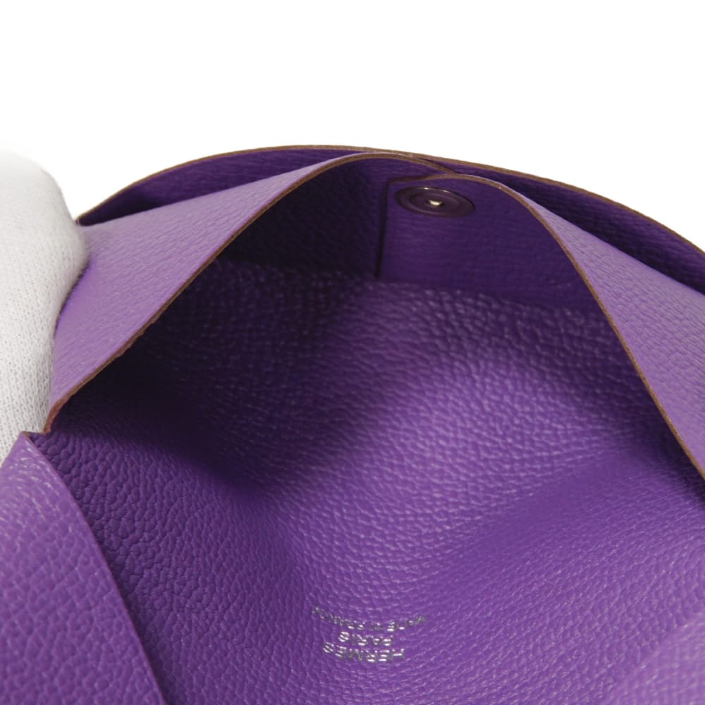 Used 9212 Calvi 7946 Chevre Mysore Goatskin Bag with Gold-stamped Logo and Purple Snap Buttons. Excellent Condition.