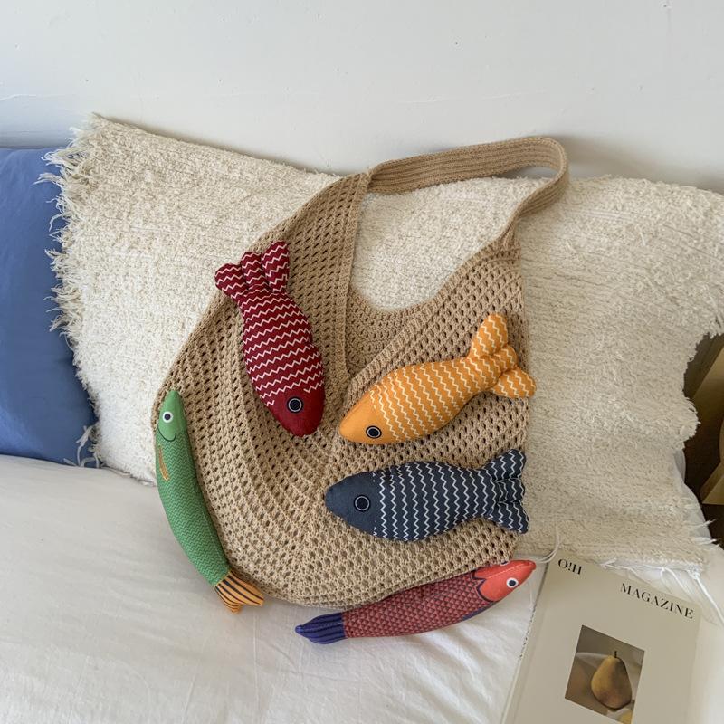 Niche bag women's large-capacity new summer leisure shoulder knitted woven bag commuter tote bag