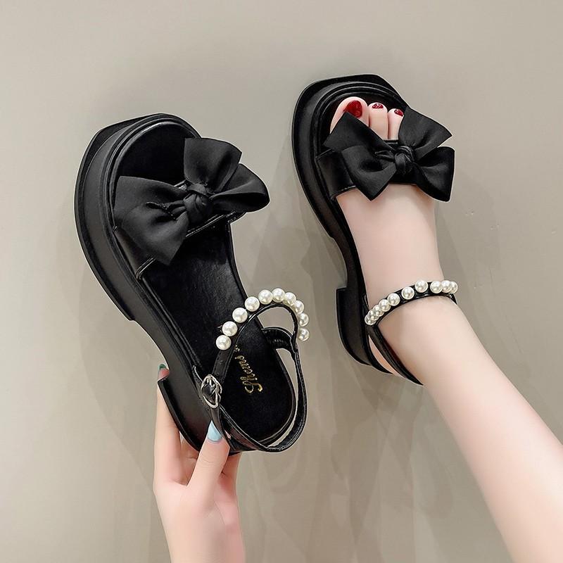 Plateausandalen Feenstil mit Rock 2025 Sommer neu Schleife Damenschuhe Perle Mode vielseitig Strandschuhe