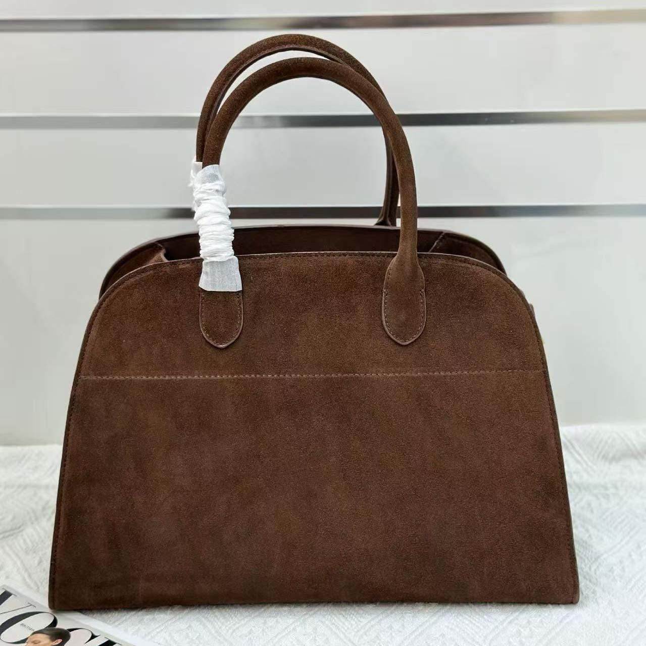 

2025 Новая модель через границу Сумка-тоут Margaux из коровьей кожи Натуральная кожа Повседневная сумка через плечо Простая сумка с одним отделением Женская 39x23x28cm