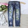 Jeans elasticizzati stampati a fiori blu da donna Pantaloni a vita alta Pantaloni skinny strappati con toppe in denim distrutto