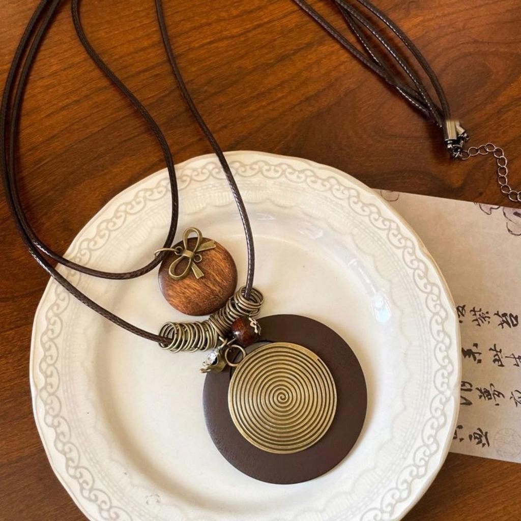Ethnic style handmade leaf round wood necklace women's literary and retro long sweater chain cotton and linen clothing small accessories pendant