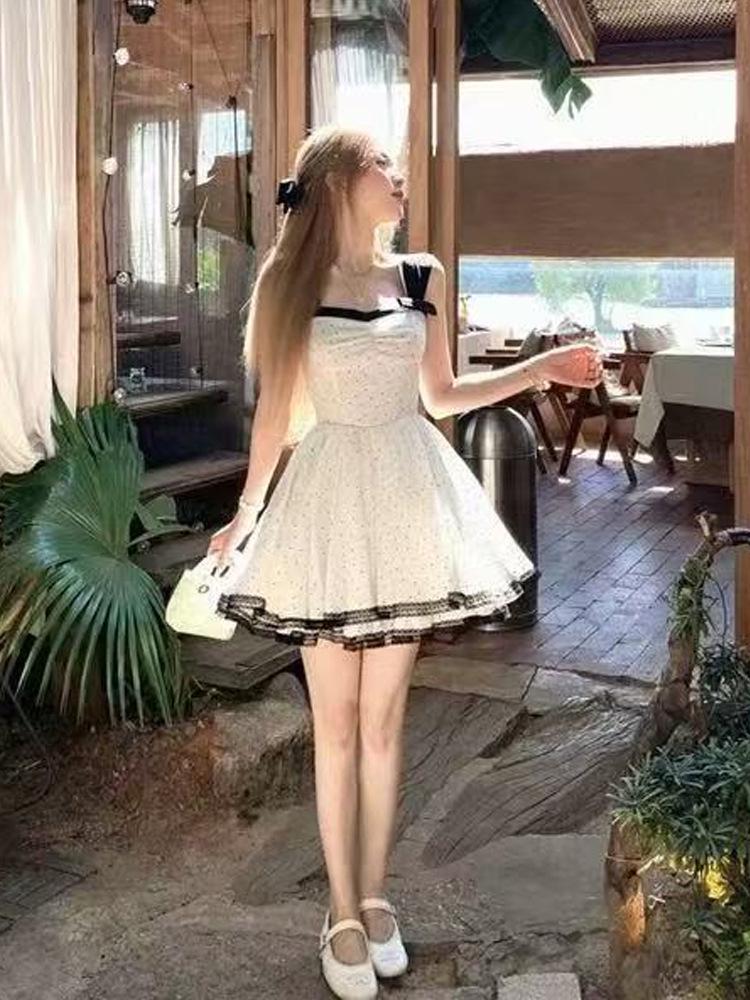 Women's French Retro Polka Dot Spaghetti Strap Dress - Elegant Summer Style with Waist-Cinch and Long, Slimming Hem