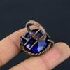 Anillo de joyería hecho a mano envuelto en alambre de cobre con piedra preciosa de zafiro azul creado en laboratorio para ella