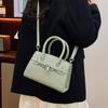 Bag women's new trendy high-end fashion niche design shoulder messenger bag portable platinum bag