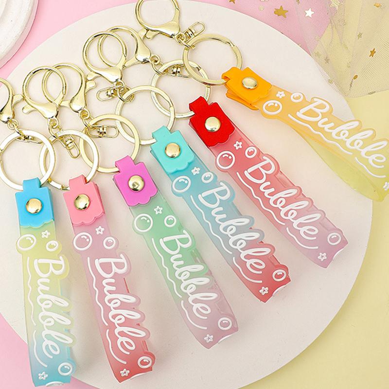Transparent Pvc Soft Rubber Rope Keychain English Small Flower Jelly Color Plum Blossom Candy Color Drop Adhesive Wristband