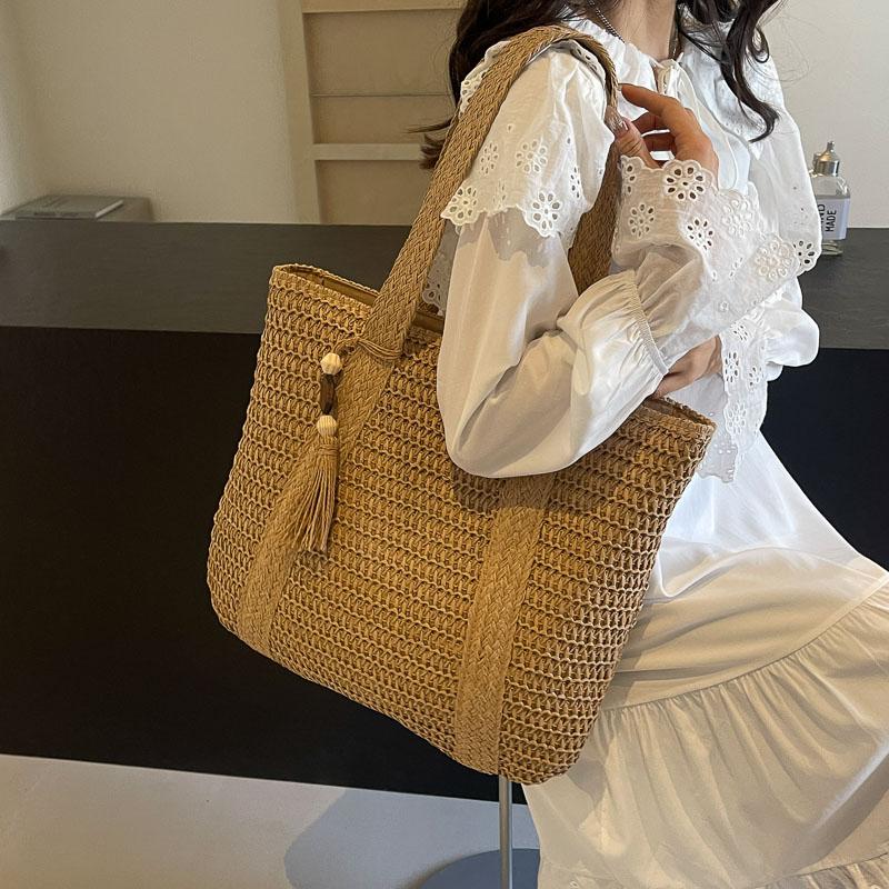 Handwoven Straw Tote Bag Women's Summer Beach Bag with Tassel Detail and Lightweight Design