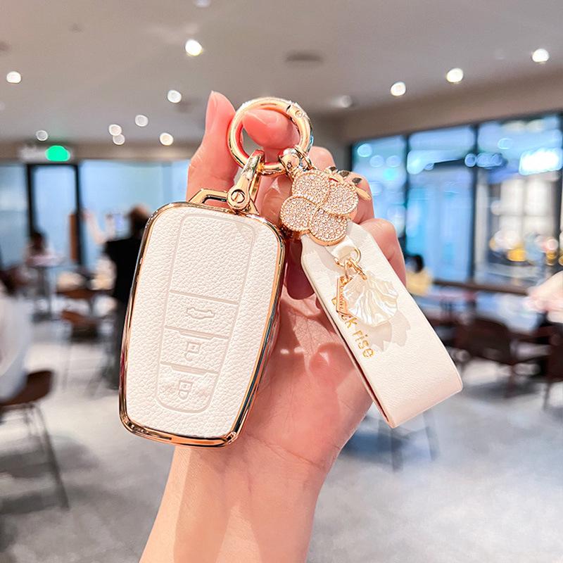 Toyota Key Cover for Camry, RAV4, Corolla, Levin, Avalon: Stylish Shell Buckle for Women.