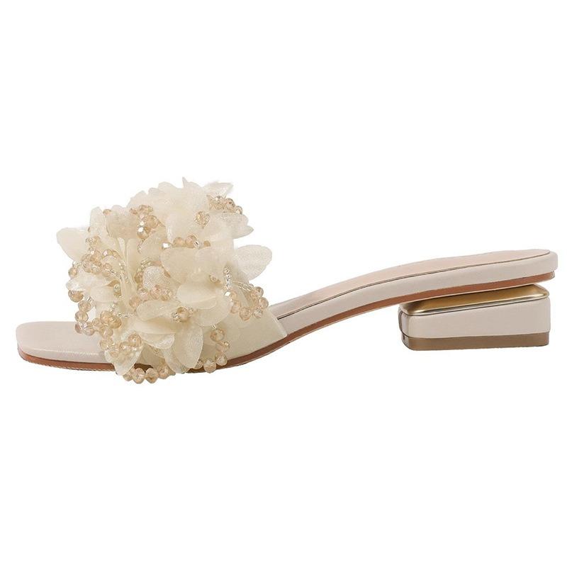 New celebrity niche flower fairy thick heel cool slippers female summer wear fashion out flat bottom one-word