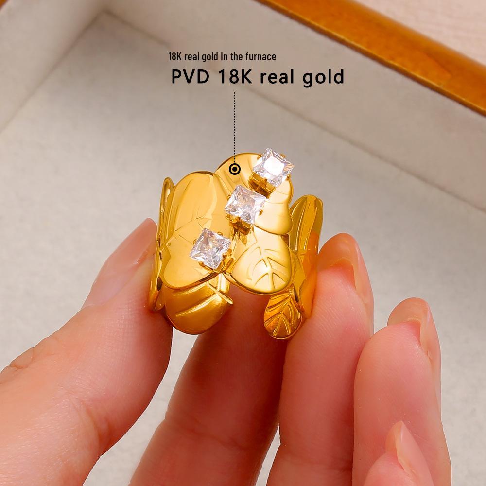 YueShi Luxury Zircon Leaf Ring - European & American Design, Versatile, Elegant, Cross-border Style.