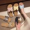 French flat-bottomed slippers women's summer wear 2025 new Internet celebrity fashion retro woven soft bottom word beach sandals