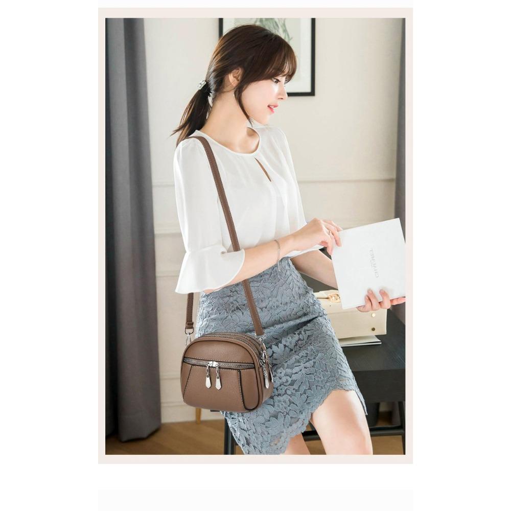 2026 New Summer Small Single Shoulder Messenger Bag Women's Three-Layer Round Luxury Simple Messenger Bag Cowhide Zero Wallet