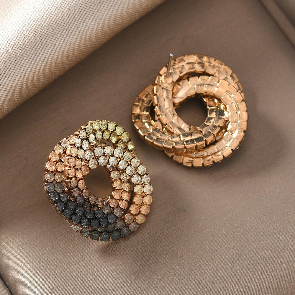 Elegant Geometric Hollow Diamond Stud Earrings for Women - Luxury Niche Design