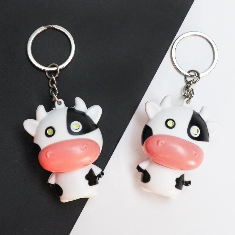 Creative LED Cow Keychain with Light and Sound Cute Q Version Pendant for Phone Cases and Backpacks