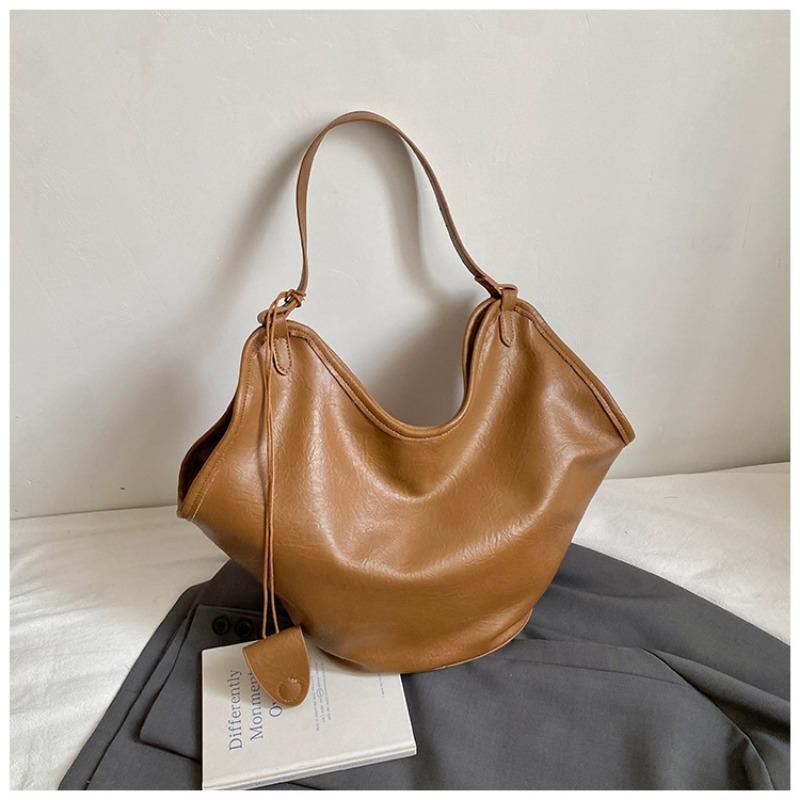 

The Litchi Patterned Tote Bucket Bag Is A Niche High-end Stylish Single-shoulder Handbag светло-коричневого