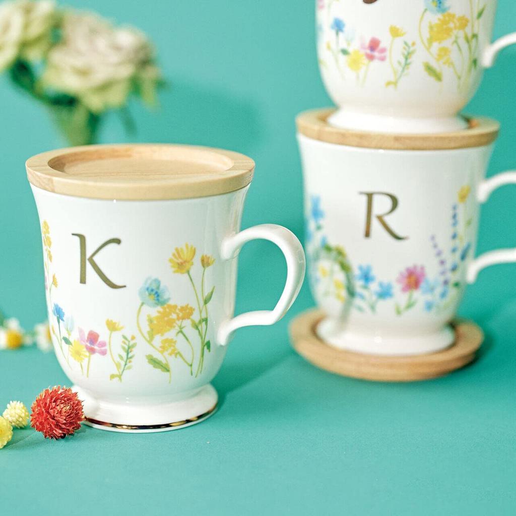 This Elegant 350ml Mug Features a Delicate Floral Design and a Gold Initial It Comes with a Coaster That Doubles As a Lid or Small It Also Comes In a