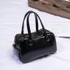 Minimalist Boston-style handbag, a simple solid-color crossbody/shoulder bag perfect for women's everyday casual wear.