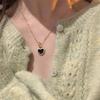 Black and white double-sided drip glaze love necklace 2025 trendy light luxury niche peach heart sweater chain accessories