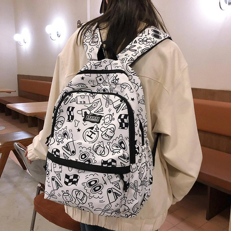 

Backpack female cute high school junior high school student large capacity trendy backpack simple small fresh student schoolbag чорний