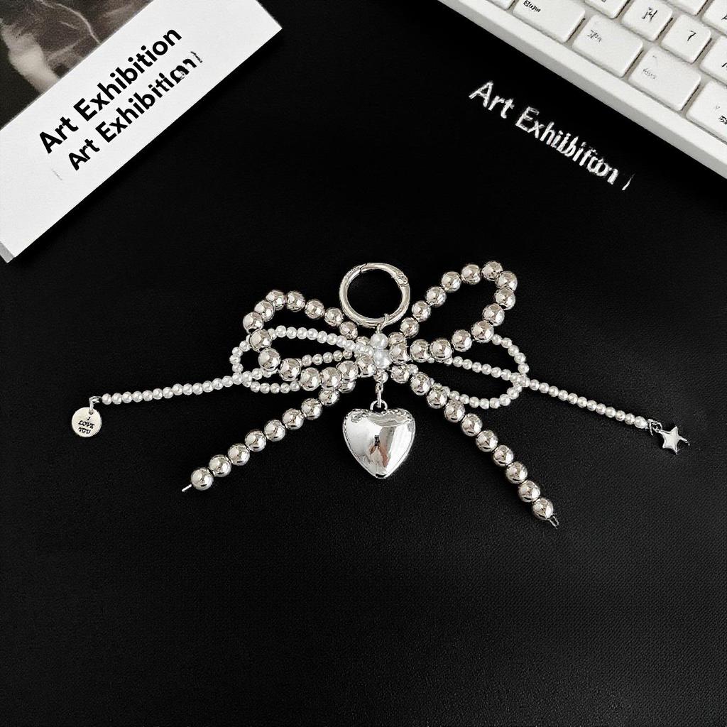 Korean Sweet Pearl Bow Heart Pendant Keychain & Charm Accessory
