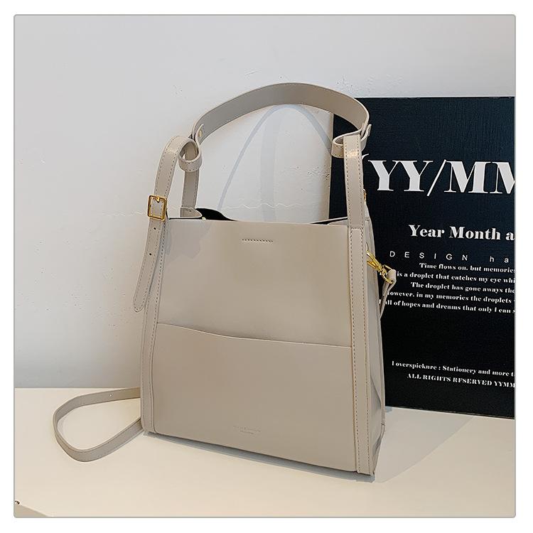 

2025 Новая сумка-тоут большой вместимости Женская сумка Модная Универсальная Премиальная Текстура Повседневная Портативная Подмышечная Наплечная Сумка Кроссбоди светло-серый