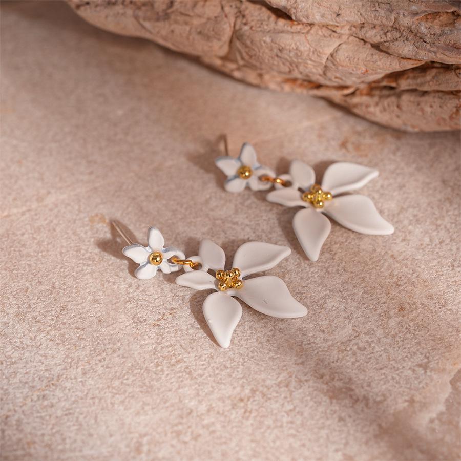 

Серьги-подвески «Цветок серебряной иглы дофамина»: Изысканные, универсальные подвесные украшения с высококлассным видом.