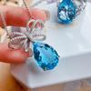 Elegant Bowknot Heart Necklace with Simulated Sea Blue Topaz Teardrop Pendant – New Niche Design