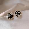 Elegant Gold-Plated Black Zircon Stud Earrings - Niche Design for a Luxurious Fashion Statement