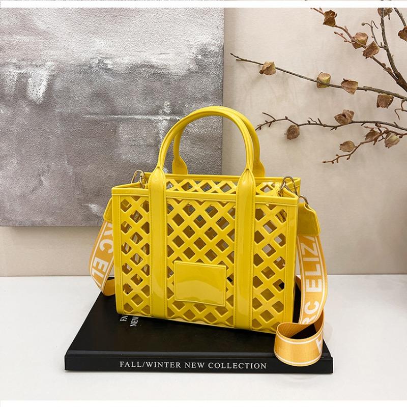 Mode Bonbonfarbe Strandtasche Damen neue personalisierte hohle Handtasche Nische Schultertasche Umhängetasche