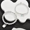 Europäisches Spanisch Hochwertiges Spleiß-Armband mit unregelmäßigem Wassertropfen-Anhänger, Feminines Hufeisen-Anhänger-Armband für Damen