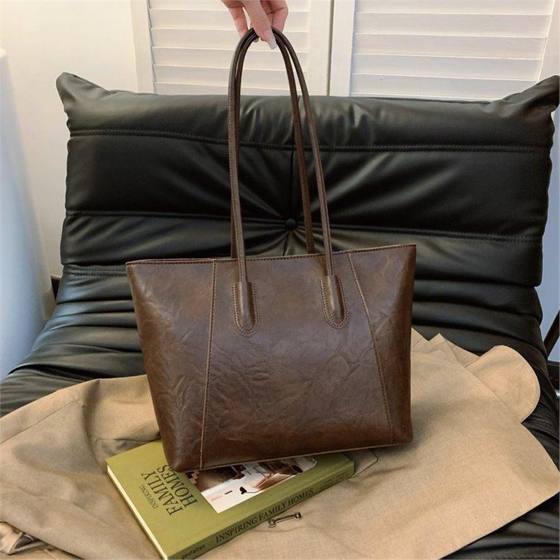 Korean version of fashionable large-capacity tote bag women's 2025 new simple casual shoulder bag commuter versatile portable women's bag