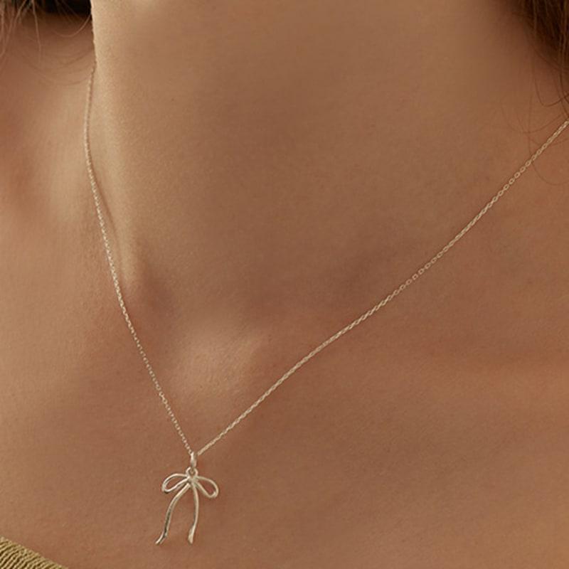 

Lewe [6mm+10mm pearl earrings included] Line ribbon necklace Silver