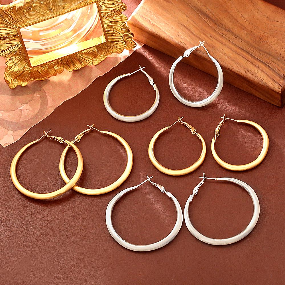 Trendy European & American Matte Gold Earrings: Sleek, Fashionable, High-End Style with a Modern Edge