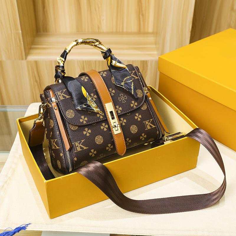 

Niche design wide shoulder strap women s bag new portable small square bag fashion printing color matching single shoulder messenger bag