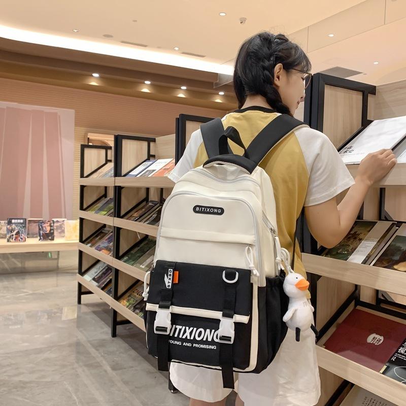 

Student schoolbag contrasting colors, primary and secondary school students multi-compartment backpack, large-capacity multi-functional backpack чёрный