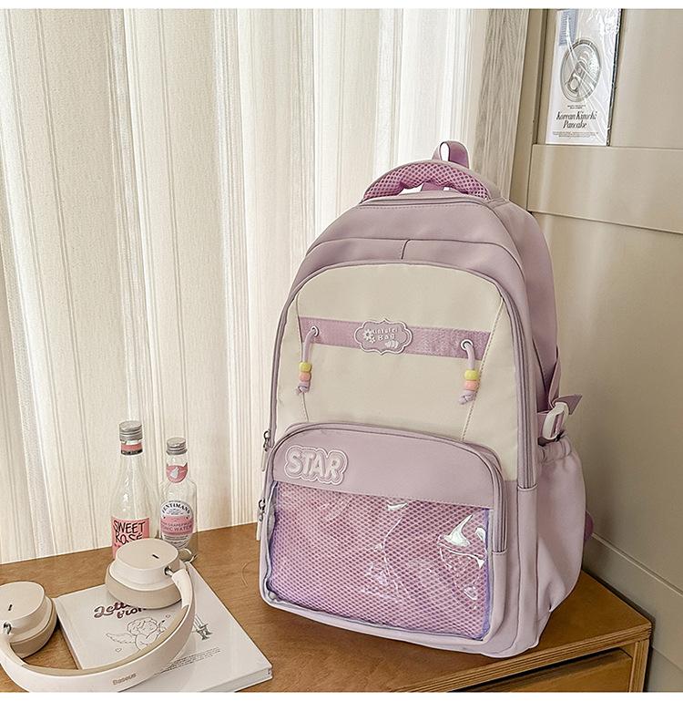 Small fresh contrasting color schoolbag niche design casual versatile children's backpack high value light burden reduction shoulder