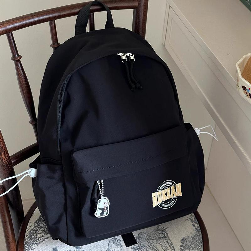 Versatile college student schoolbag women's high-value lightweight travel small backpack ins wind junior high school women's backpack