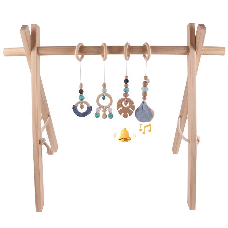 China Manufacturer Exquisite Color Leaf Four-piece Fitness Rack Pendant Wooden Baby Play Activity Gym