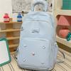 Cute Light Blue Backpack with Padded Top Handle Front Zipper Pocket Adjustable Straps Casual School Bag