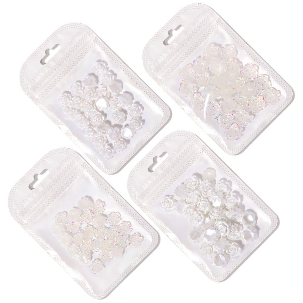 

4 Bags Hot DIY Glitter Stones Nail Art Decorations Camellia 3D Resin