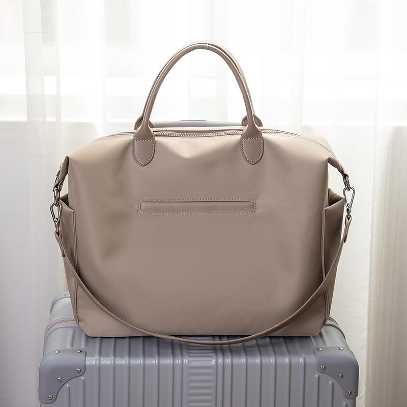 

Новая вместительная сумка-тоут из Оксфордского нейлона, водоотталкивающая, повседневная, минималистичный дизайн, для ношения в руке или через плечо, для путешествий, ежедневного использования