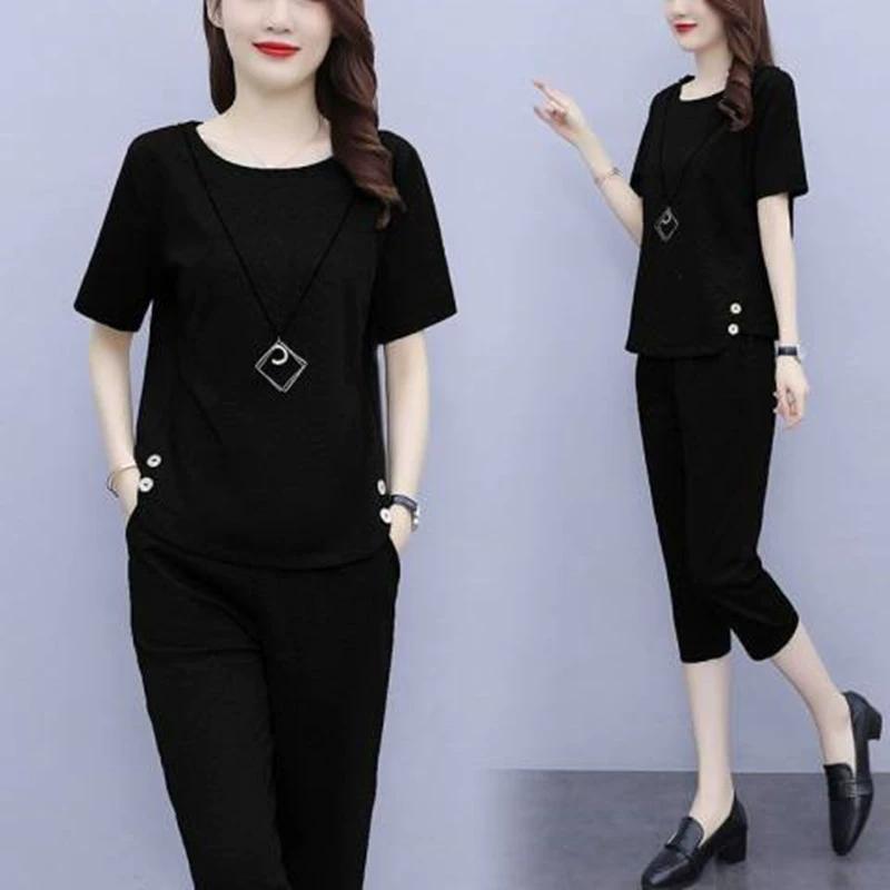 

Жіночий літній великого розміру повсякденний костюм Зручний тонкий топ з коротким рукавом + Сім штанів Однотонний Простий двокомпонентний 5XL чорний